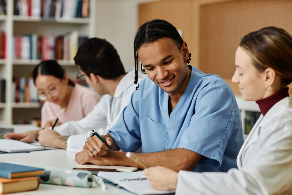 Nurse and doctors smiling